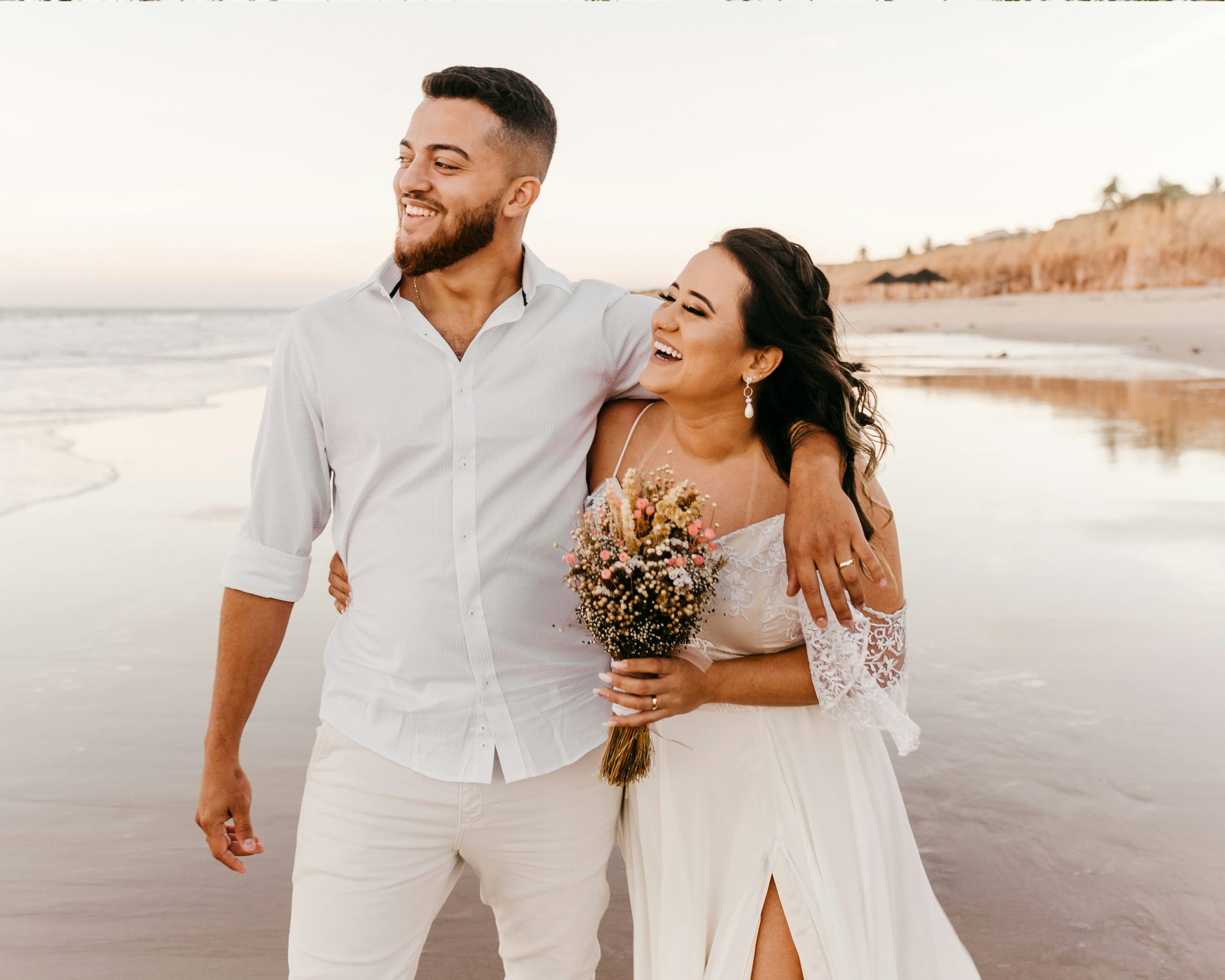 Happy couple at a beach wedding
